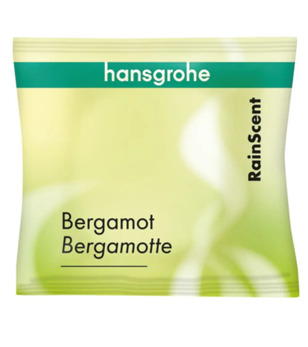 Verpackung mit Duschtabs von Hansgrohe in Bergamotte-Duft. Grünlich gestalteter Beutel mit Produktbezeichnung und Hinweis auf den Duft.